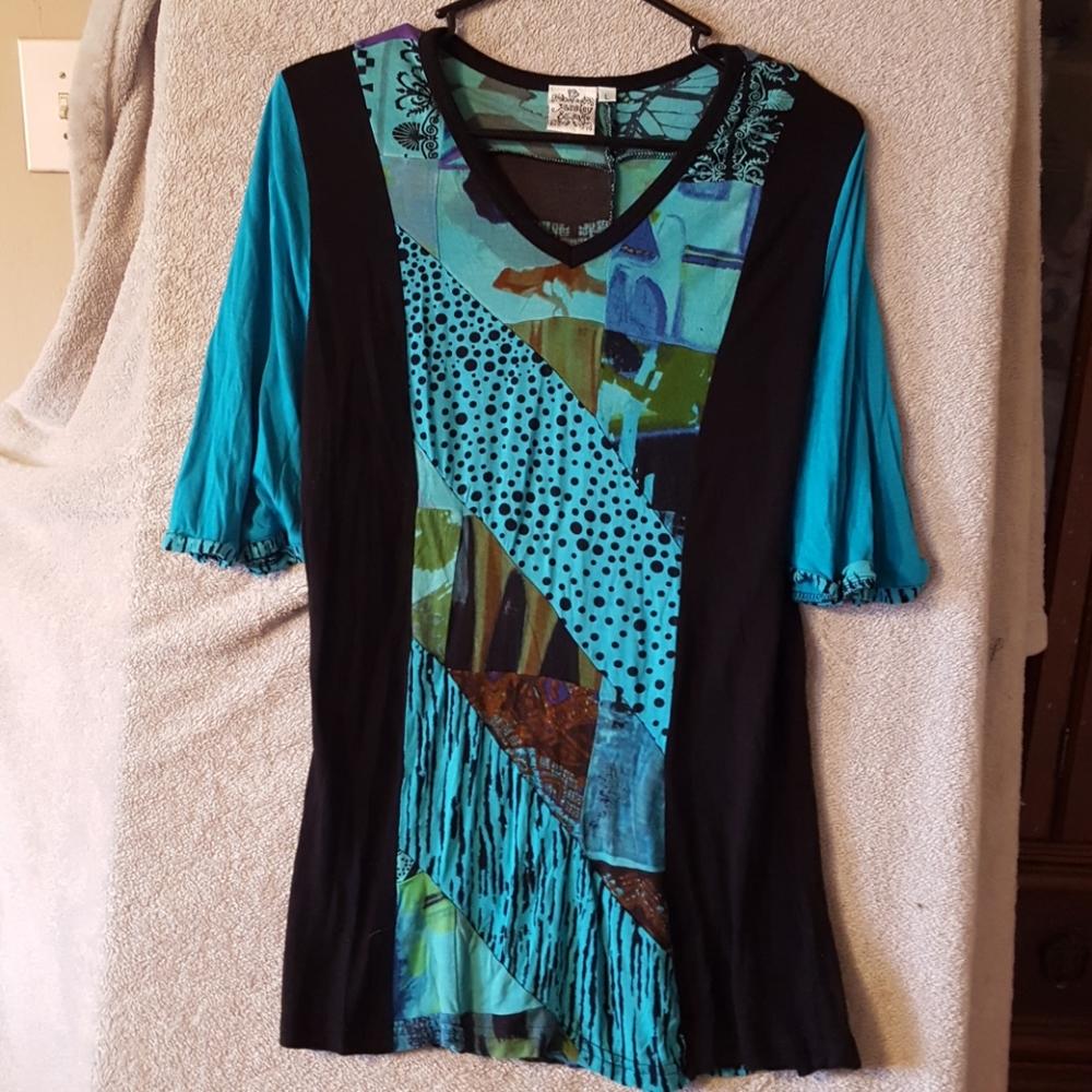 Awesome feel good top that is dressy or casual.
